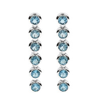 Boucles d'oreilles en argent et Topaze bleue